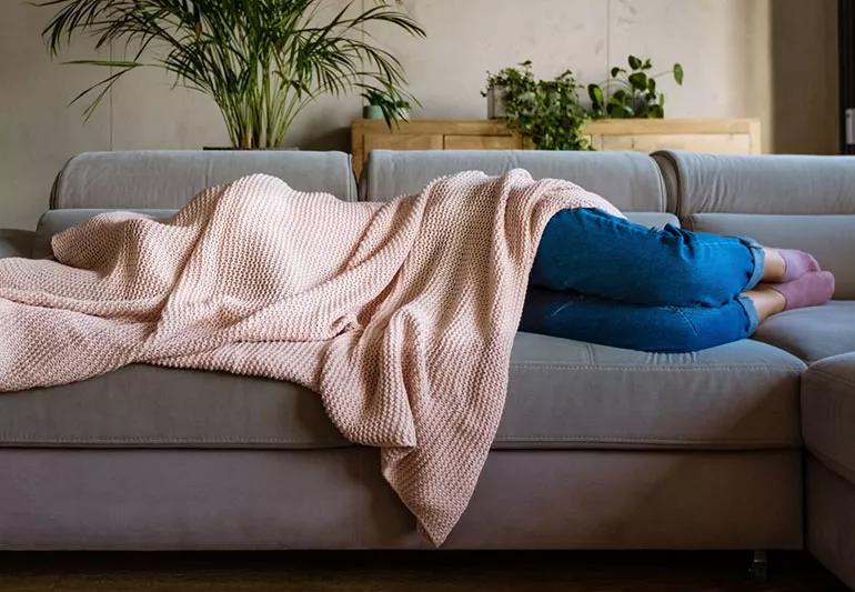 person Sleeping Under Blanket Migraine 1284882341 770x533 1 jpg