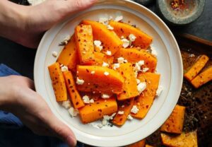 eating roasted Butternut Squash 1053348878 770x533 1 jpg