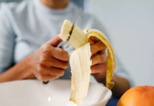 person Cut Banana 1292662472 770x533 1 jpg