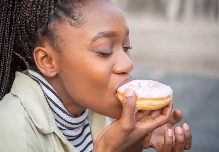 person Eats Donut 1453210475 770x533 1 jpg